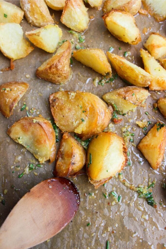 Rosemary, thyme, lemon zest mixed through potatoes.