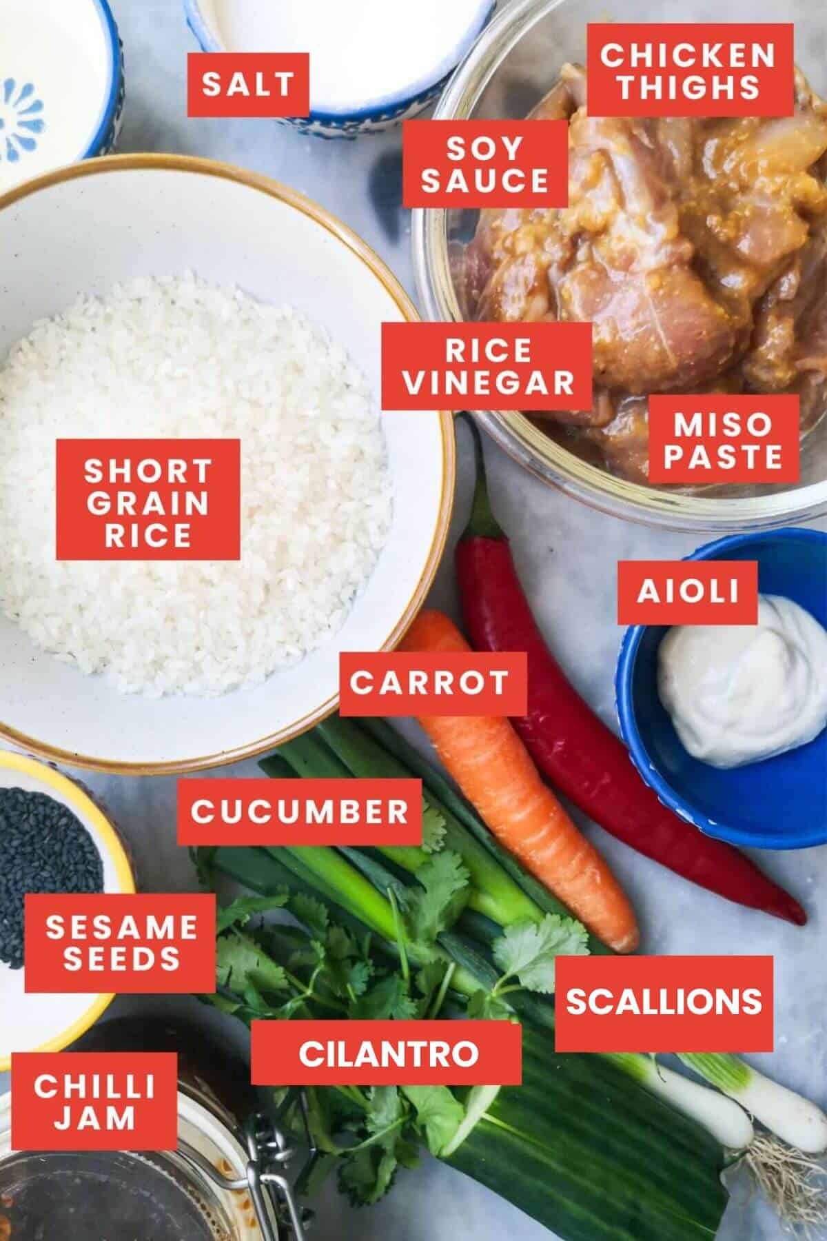 Ingredients for miso chicken poke bowls laid out and labelled.