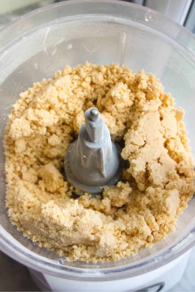 Pastry blitzed in the bowl of a food processor.