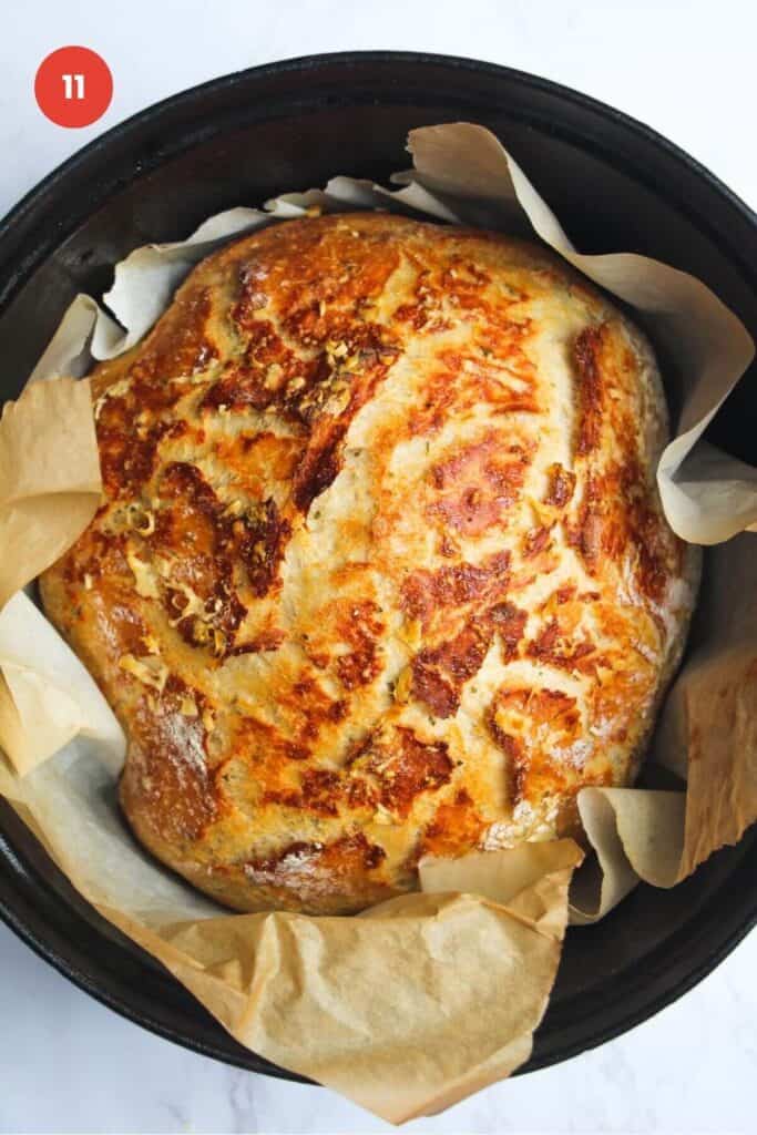 Baked rosemary parmesan bread in Dutch oven.