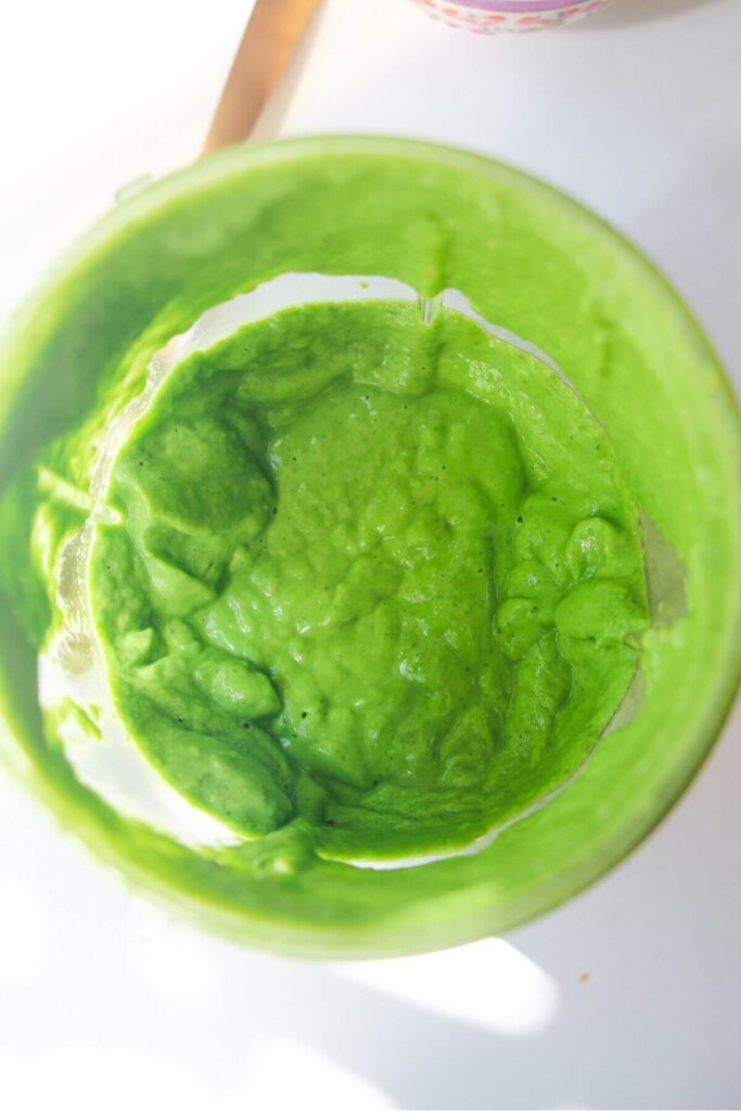 Green goddess dip blitzed up in a blender.