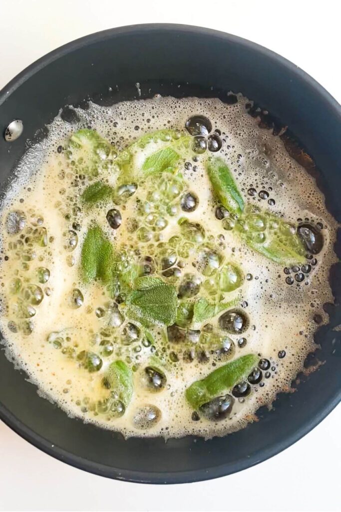 Sage leaves frying in brown butter.