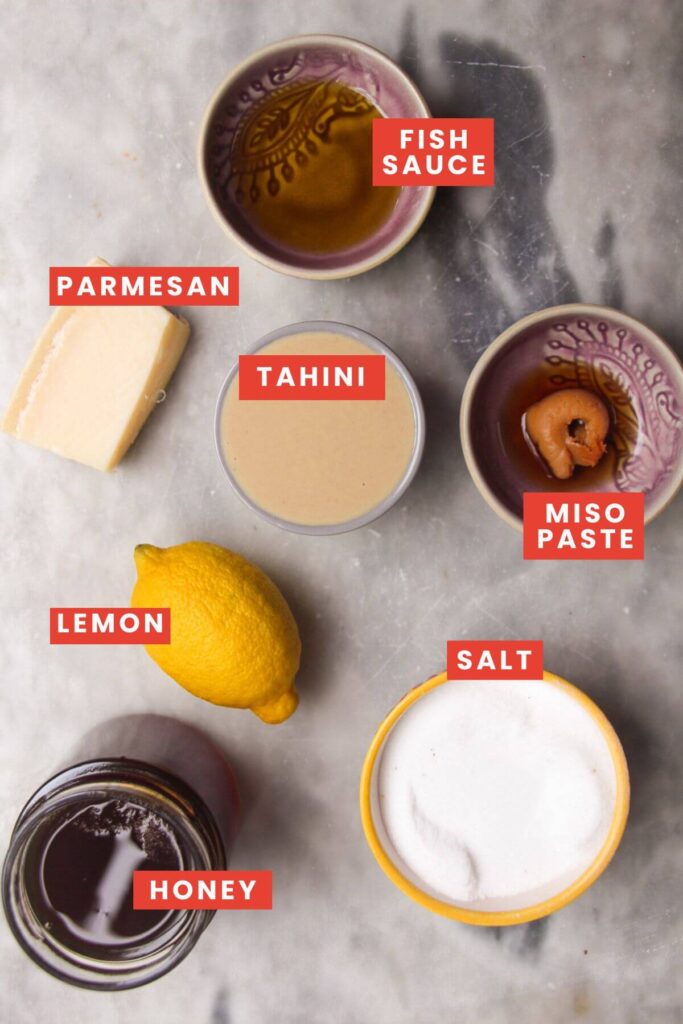 Ingredients for tahini parmesan dressing laid out and labelled.