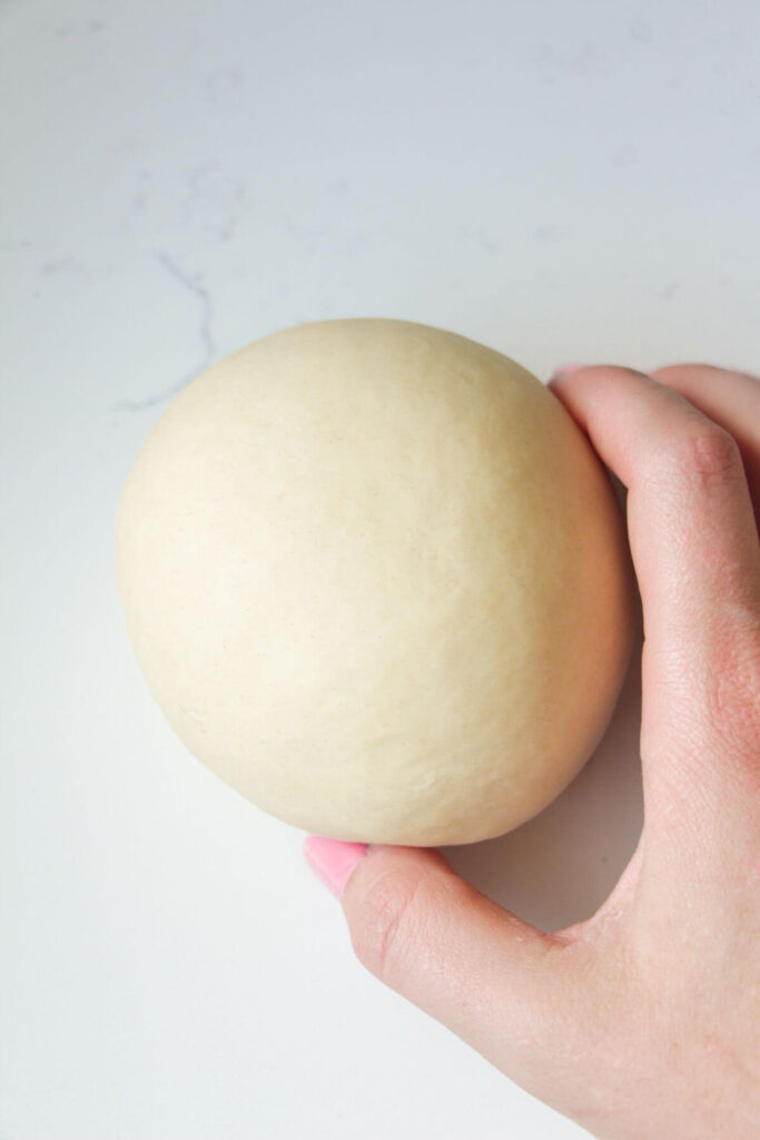 Smooth, kneaded ball of pici dough.