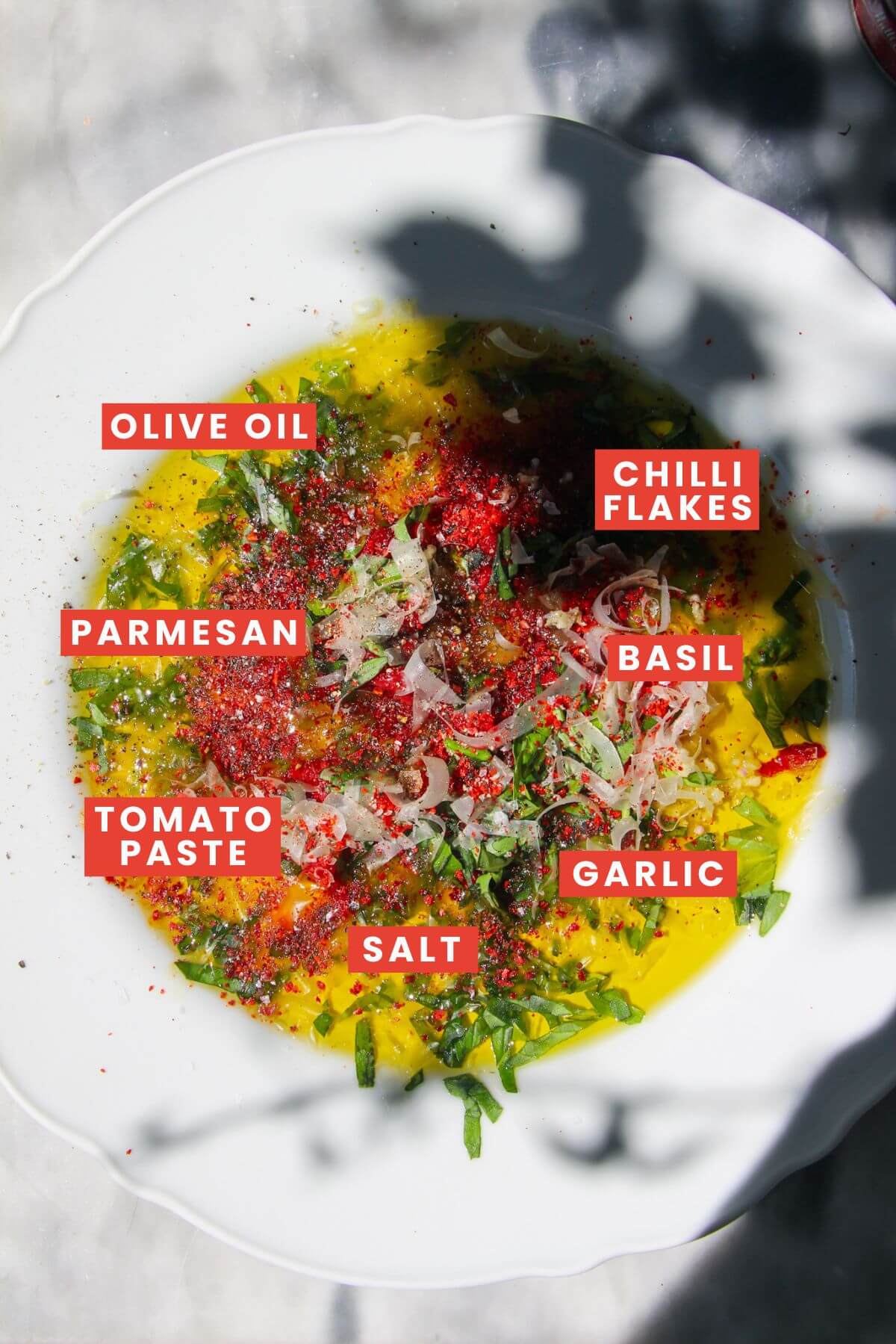 Pizza bread dipping oil ingredients laid out and labelled.
