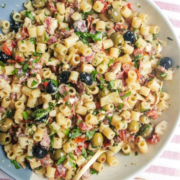 Italian deli antipasti pasta salad in a large serving bowl.