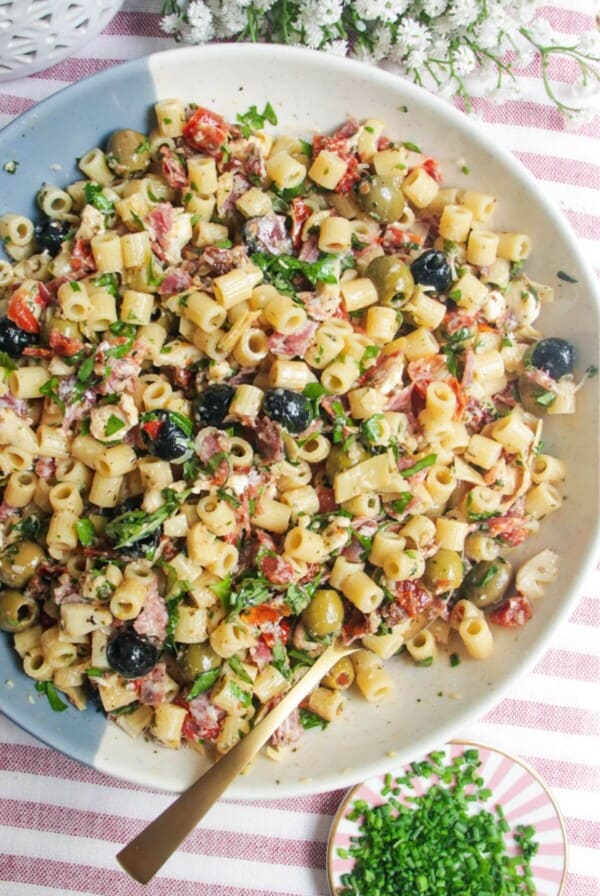Italian deli antipasti pasta salad in a large serving bowl.