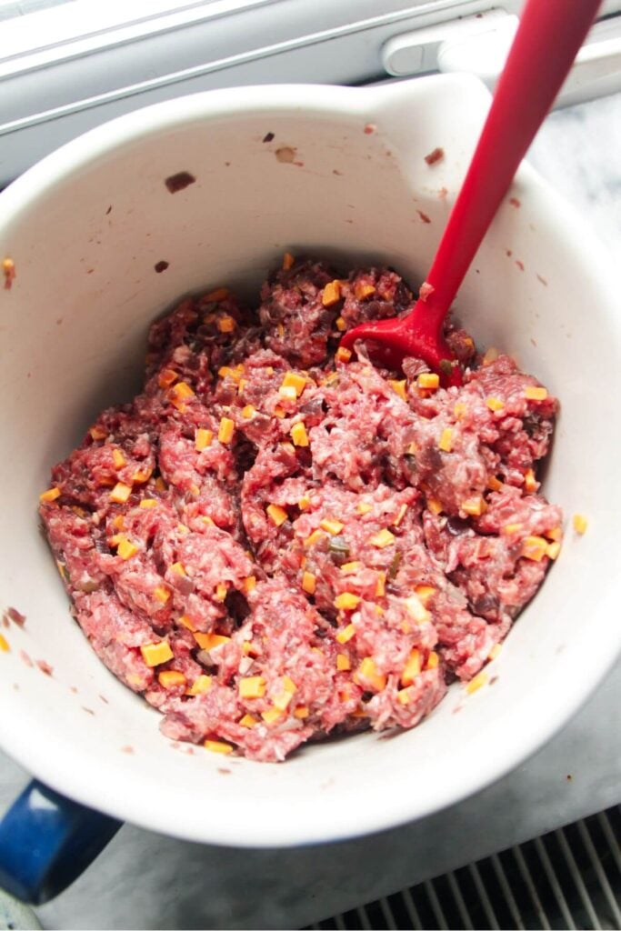 Cheeseburger filling mixed in a bowl.