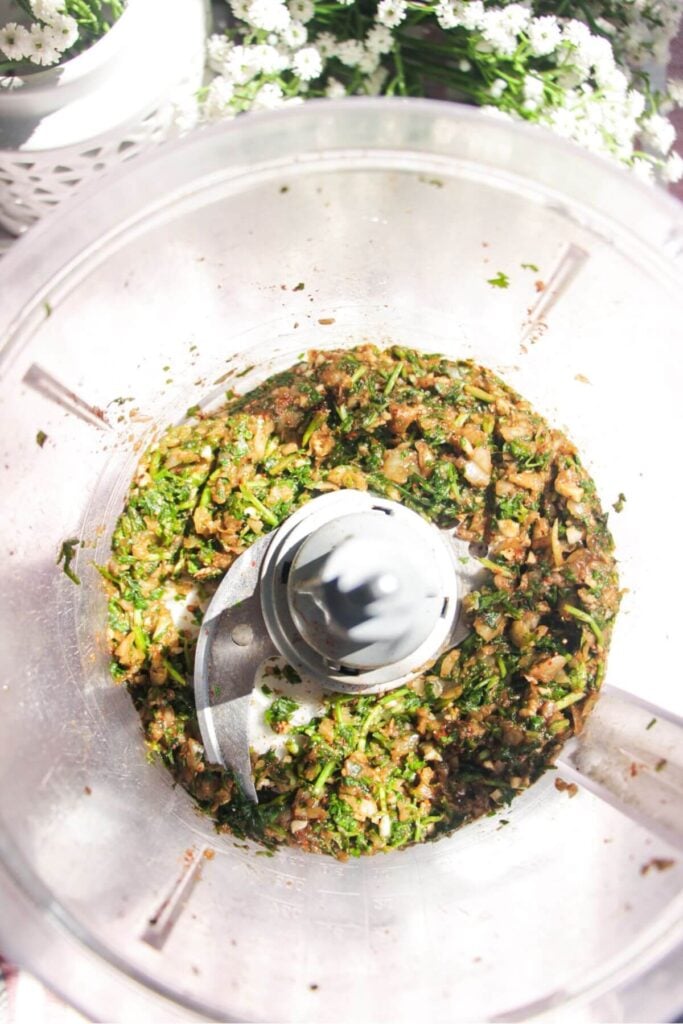 Herbs, garlic and onion blended in a food processor.