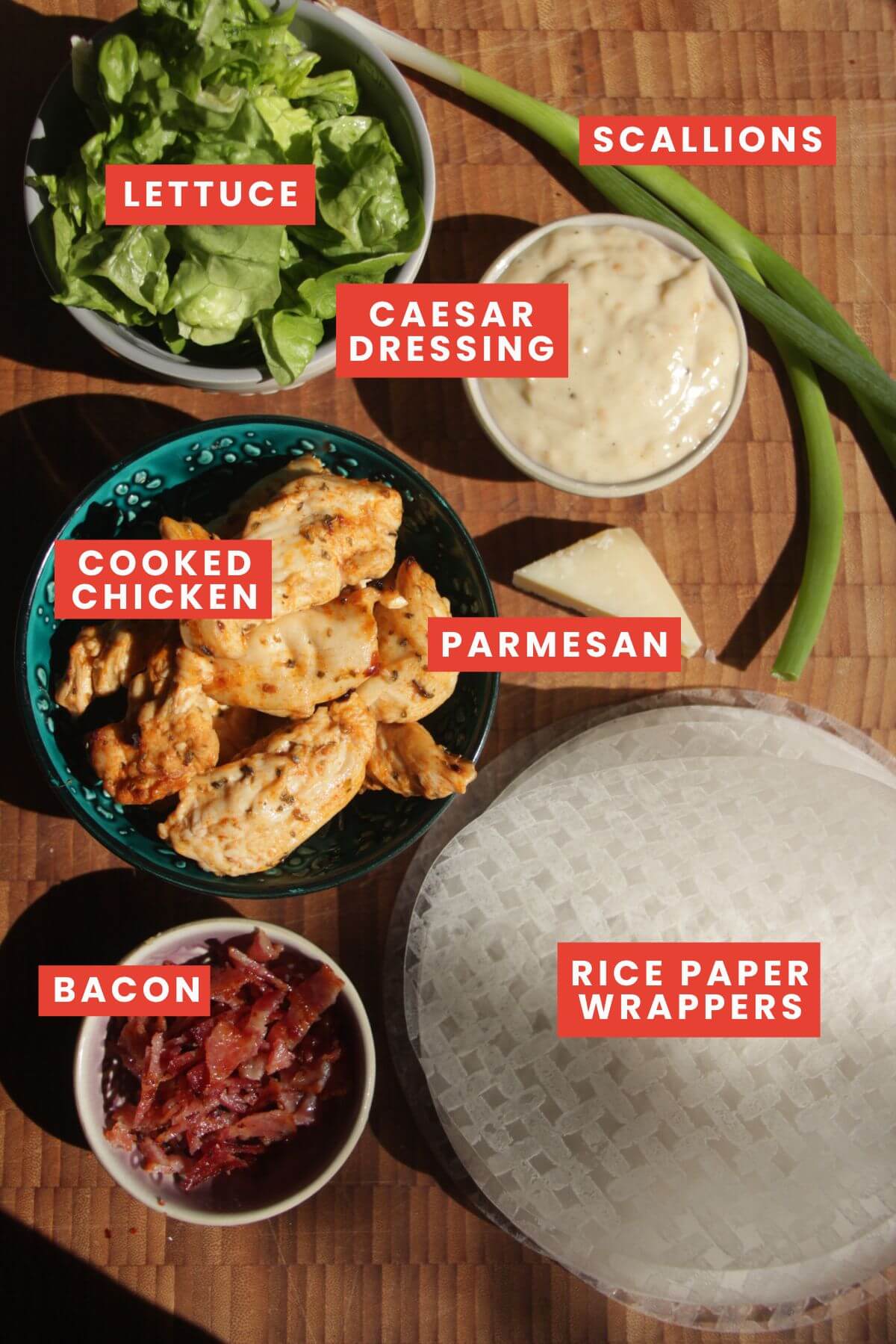 Ingredients for caesar rice paper rolls laid out and labelled.