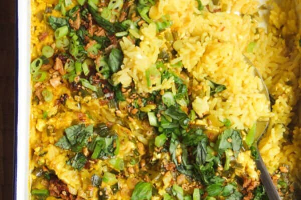 Baked rice topped with scallions and chilli oil.