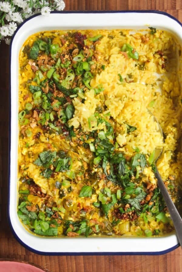 Baked rice topped with scallions and chilli oil.