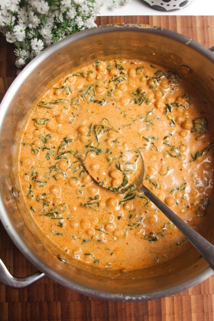 Coconut chickpea curry in a large pot.