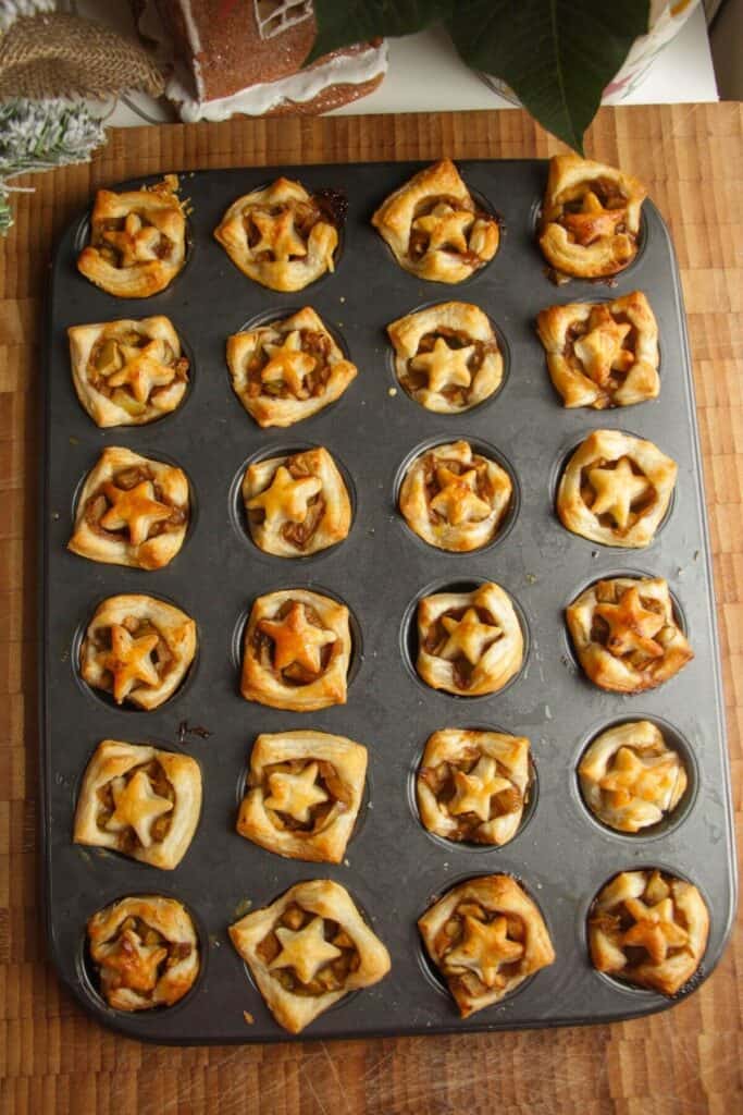 Apple pie bites cooked in a mini muffin pan.