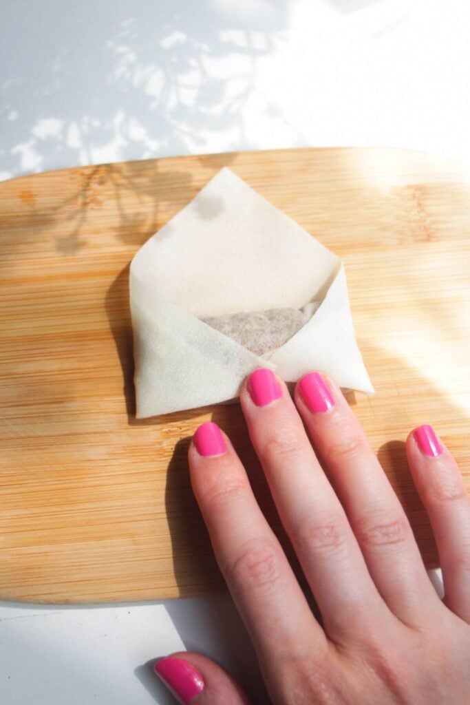 Rolling up cheeseburger spring roll.