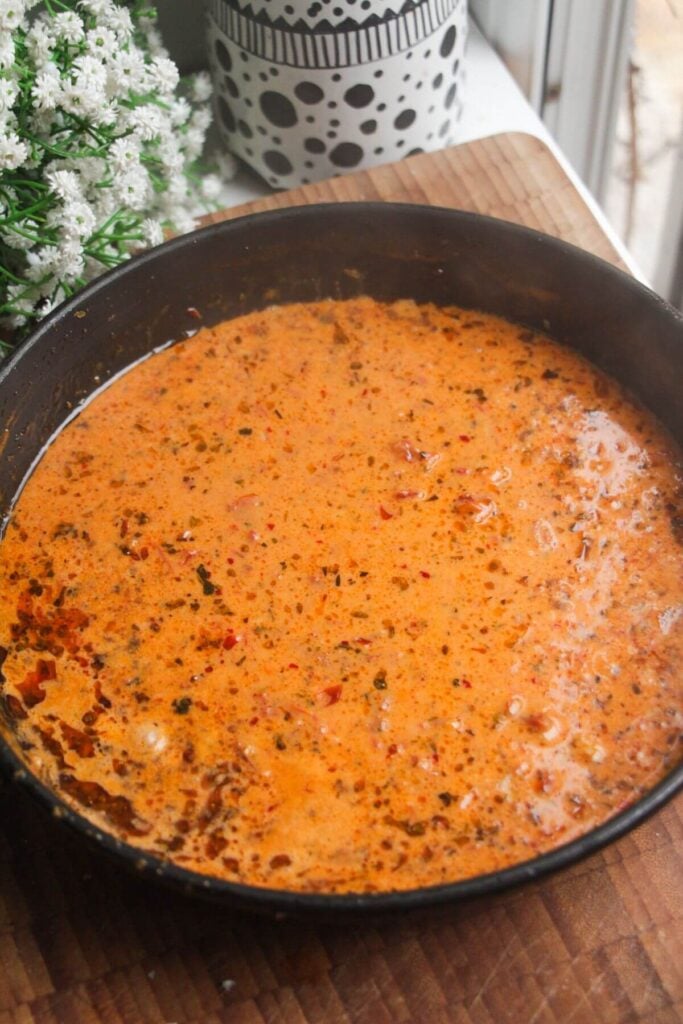 'Marry Me' sauce simmering in a pan.