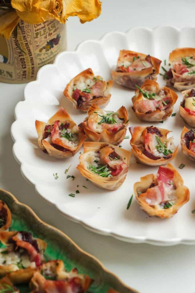 Filo bites on a large scalloped plate.