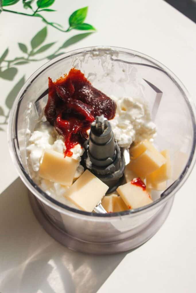 Cottage cheese, parmesan and gochujang paste in a small blender.