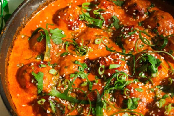 Gochujang chicken meatballs in a pan.