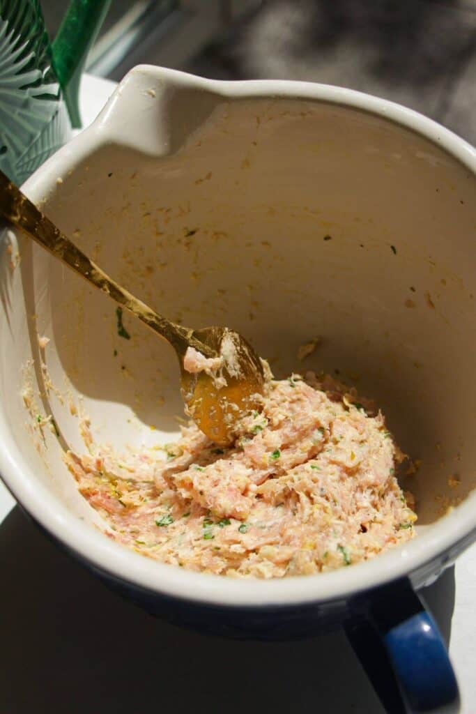 Chicken Caesar meatball mixture combined.
