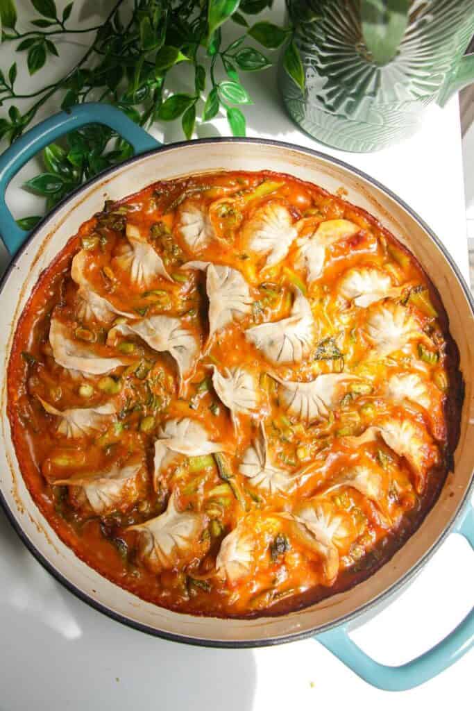 Dumplings baked in coconut satay sauce.