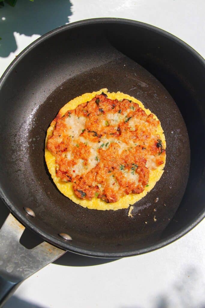 Cooked satay taco in a pan.