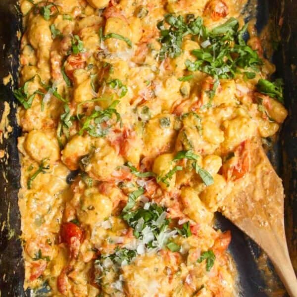 Baked cheesy tomatoey Boursin gnocchi in an oven tray.