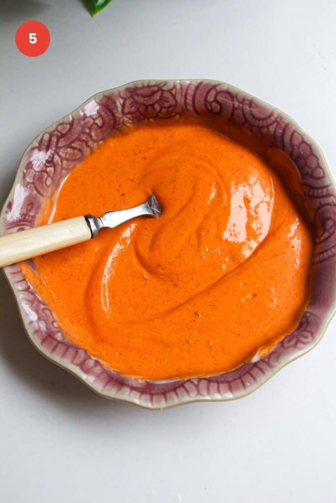 Spicy gochuang sauce in a pink bowl.