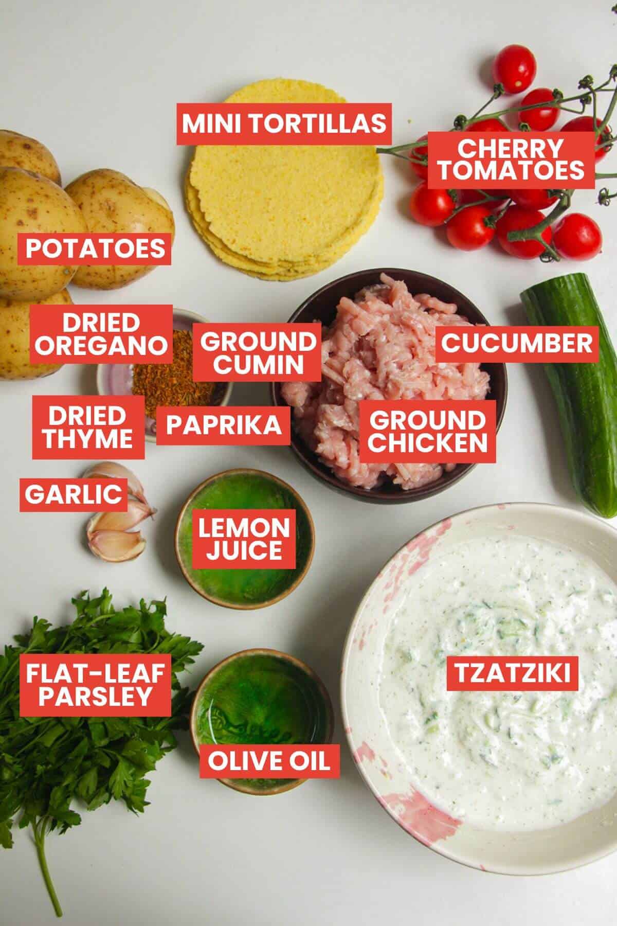 Ingredients for chicken gyros tacos laid out and labelled.