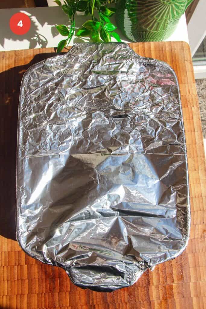 Foil tightly wrapped around an oven dish.