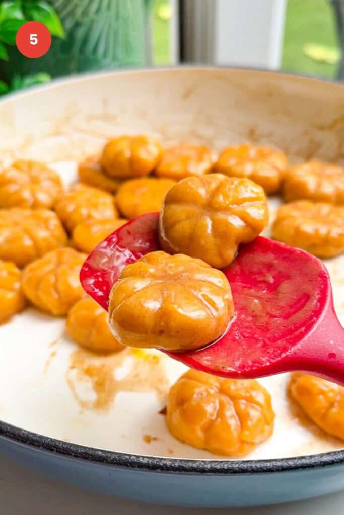Pumpkin shaped gnocchi tossed with brown butter sauce.