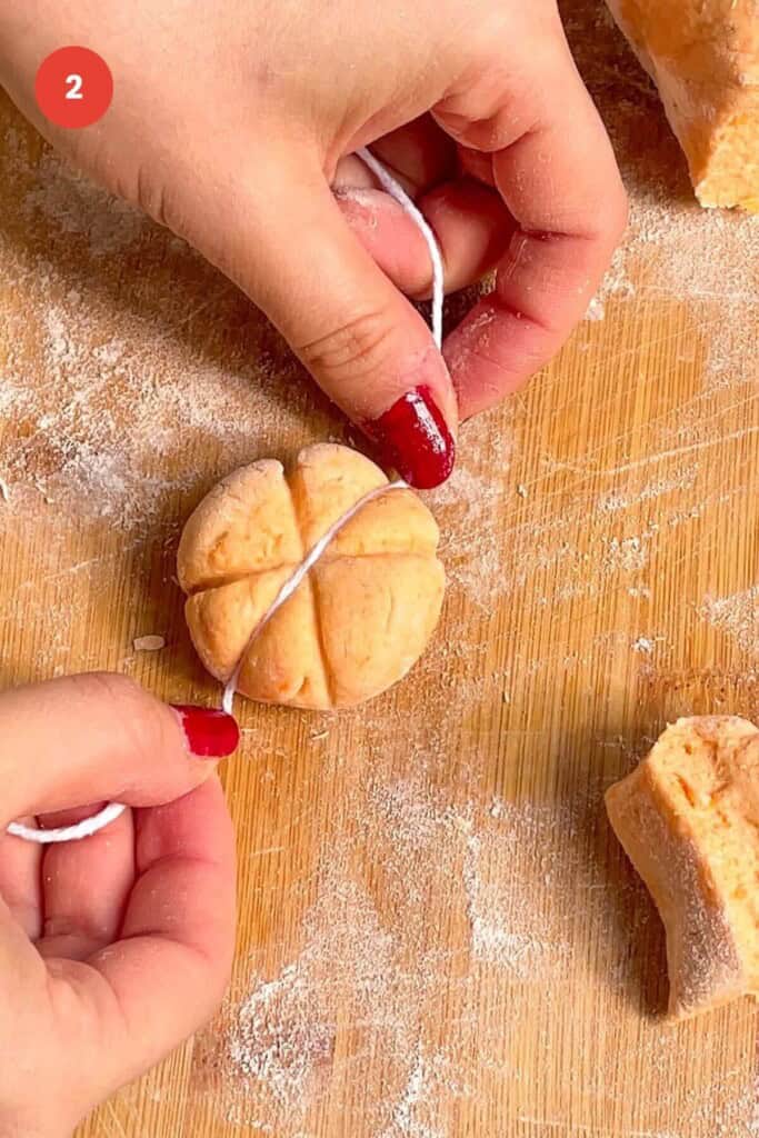 String making lines in gnocchi dough.