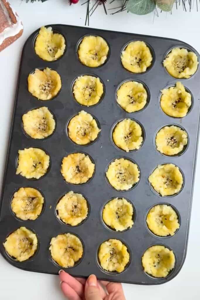 Hash brown cups ready for baking.