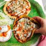 Buffalo chicken tacos on a platter.