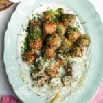 Lemon chicken meatballs on whipped feta with pesto.
