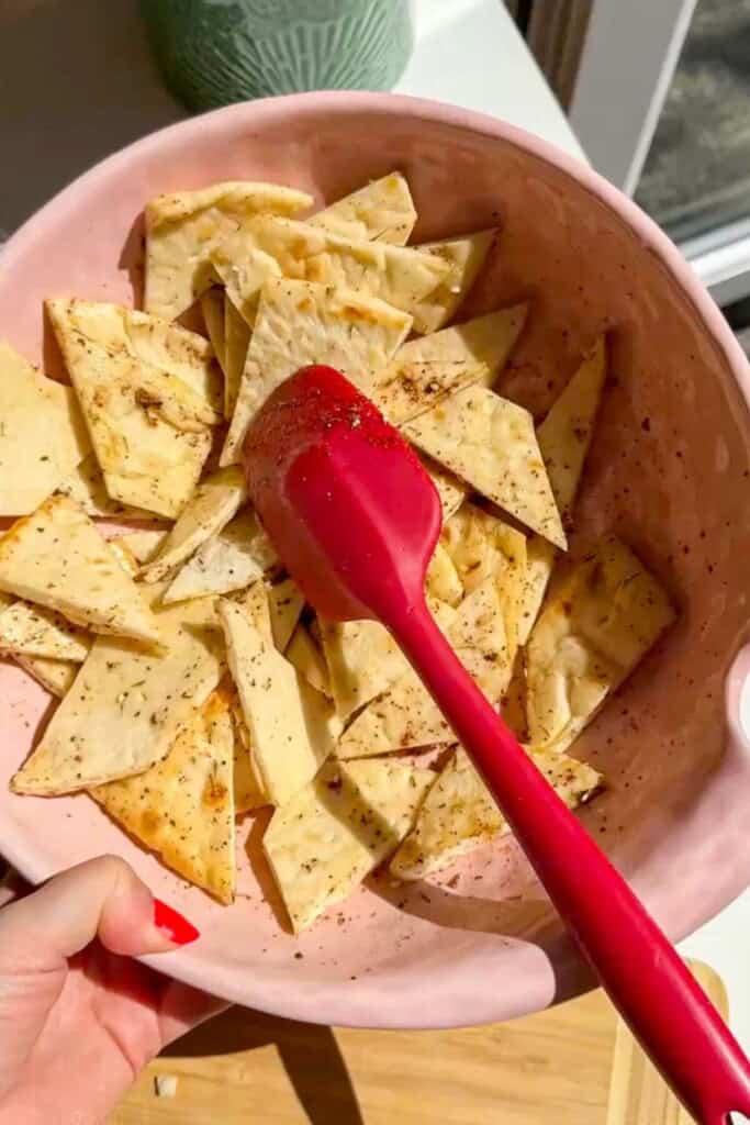 Pita bread triangles tossed with seasoning.