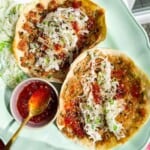 Sweet chili chicken tacos on a platter.