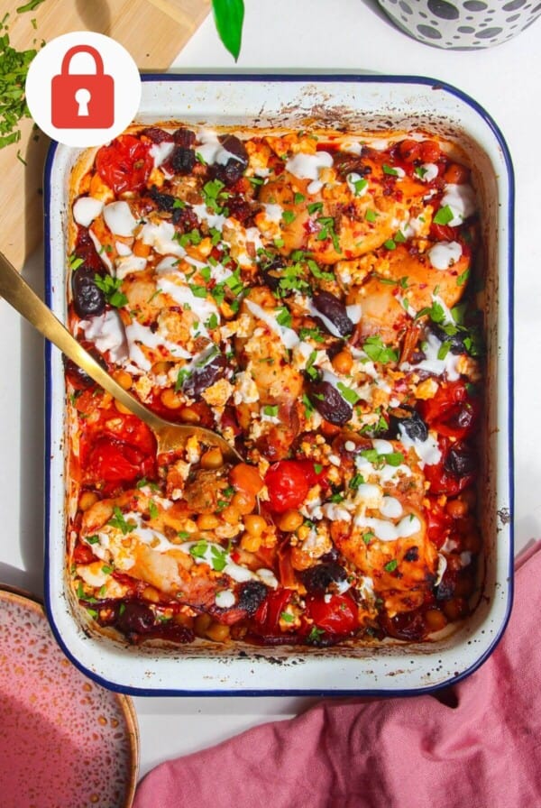 Harissa chicken baked with tomatoes, feta and chickpeas.