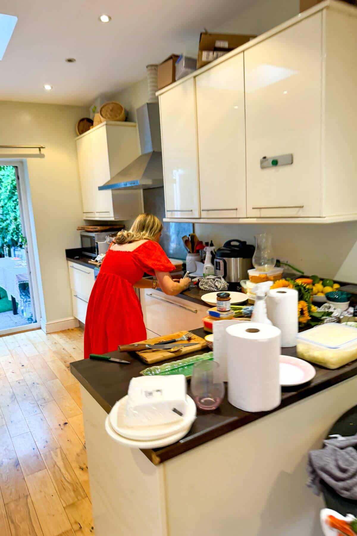Kate working in a kitchen.