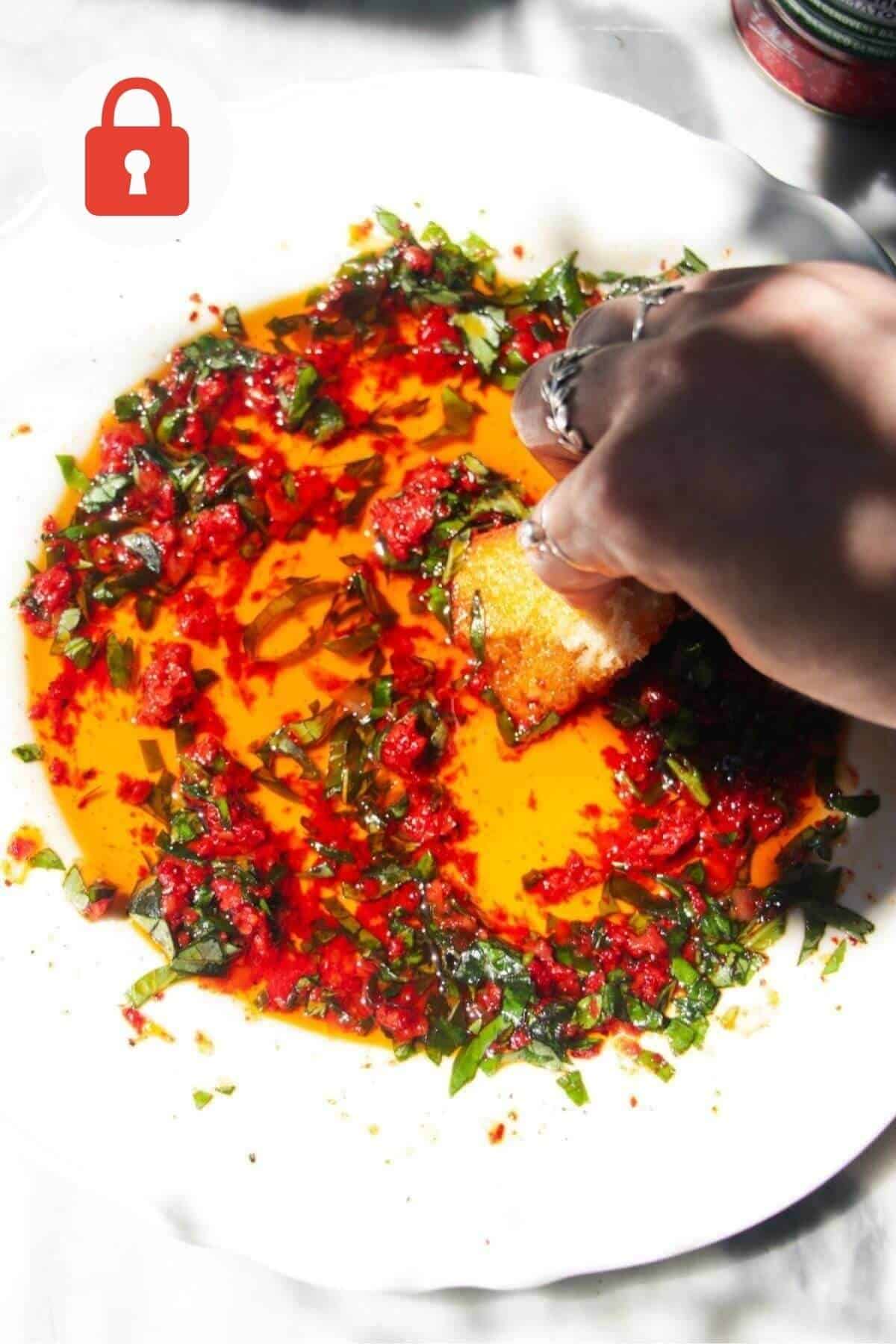 Pizza dipping oil on a serving plate.