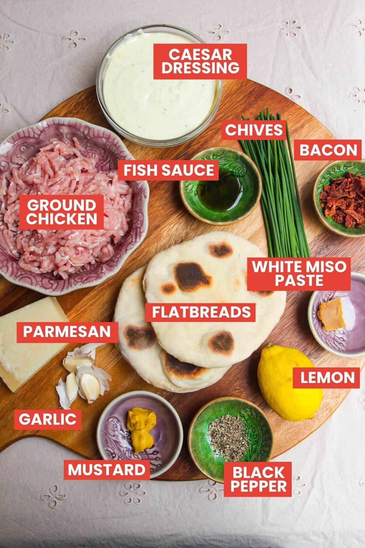 Ingredients for Caesar stuffed flatbreads laid out and labelled.
