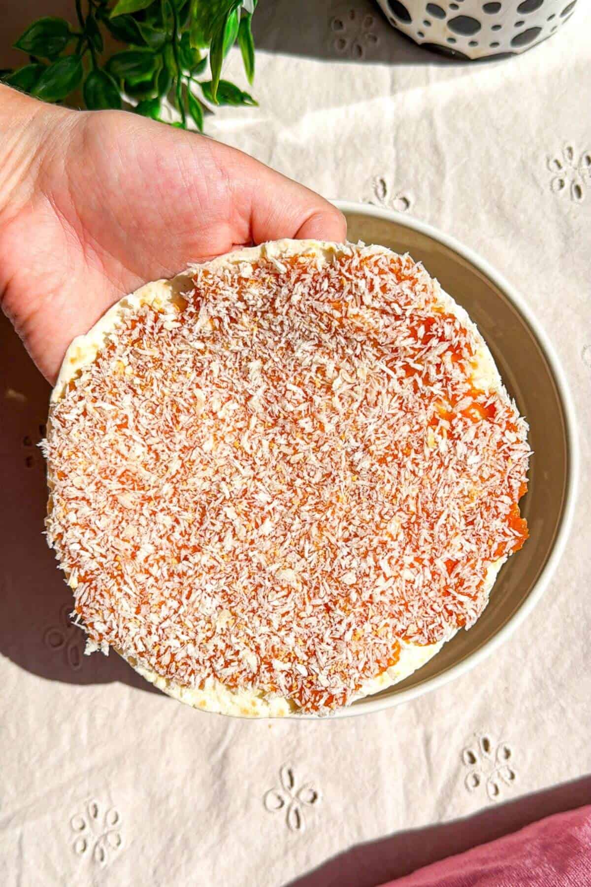 Holding a panko topped smash chicken taco.
